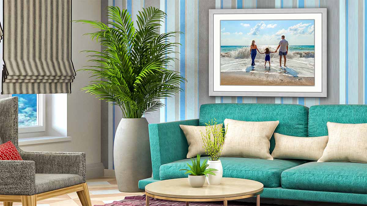 Family day out at the seaside captured in a lovely photo, then displayed in a frame that brings out the colours of the wall paper in the room