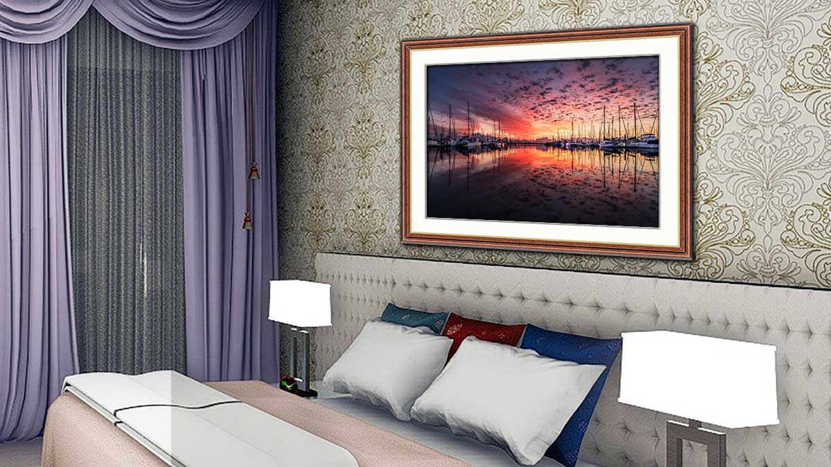 Photo print and frame of landscape featuring boats in the sunset
