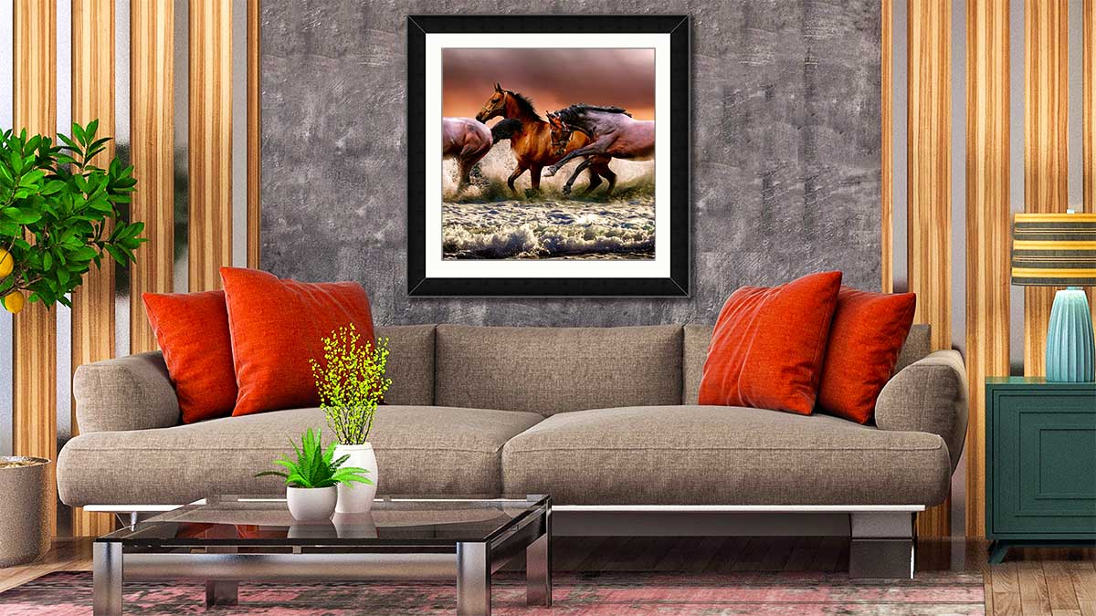 Photo of wild horses running in the sea, displayed in an understated black frame