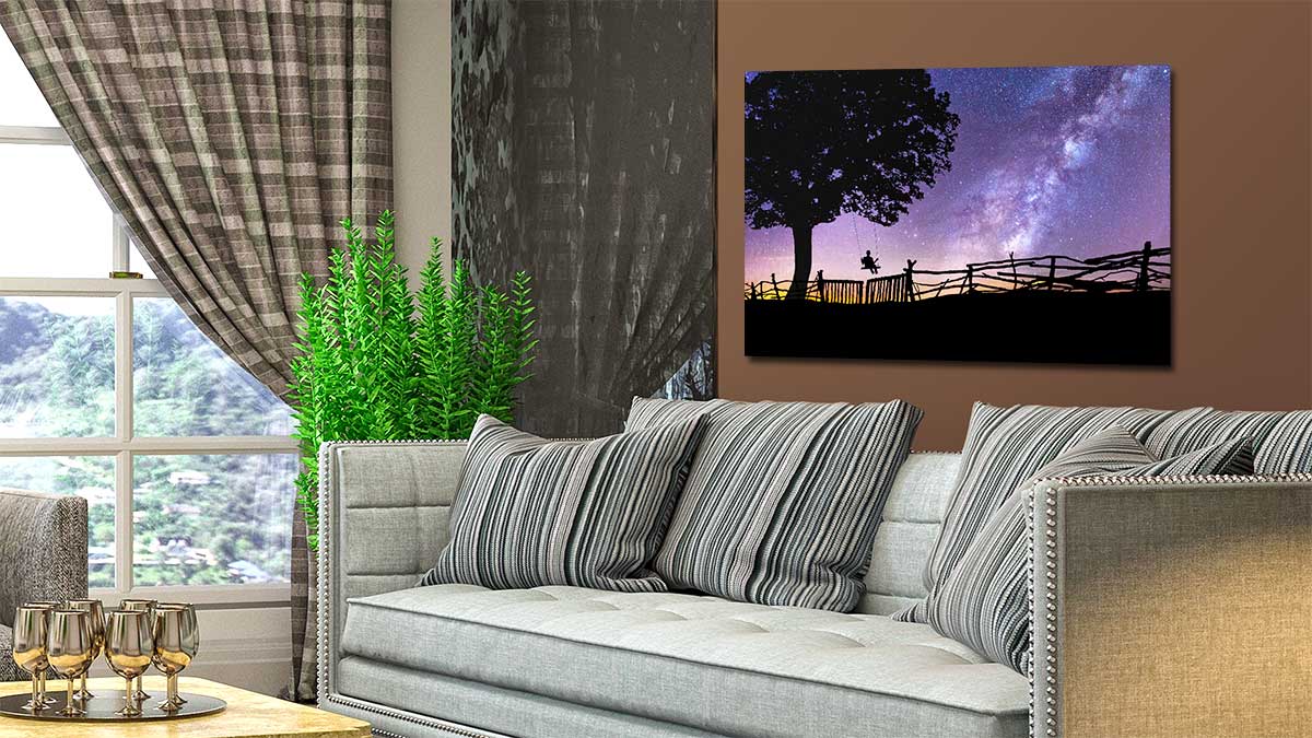 Poster of a sunset sky placed on the wall above a setter