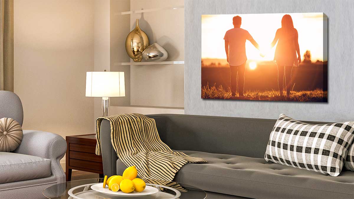 Photo canvas featuring a picture of a couple standing in the sunset holding hands