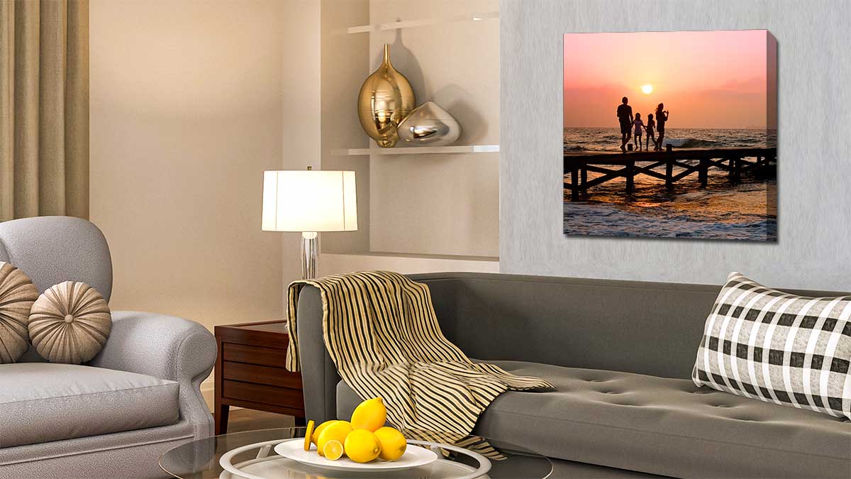 Picture of a family on a tropical island jetty in the sunset