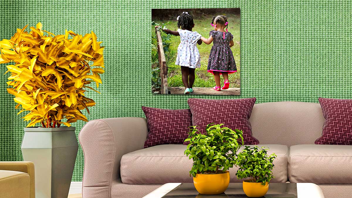 Photo of two children playing, printed on a square poster