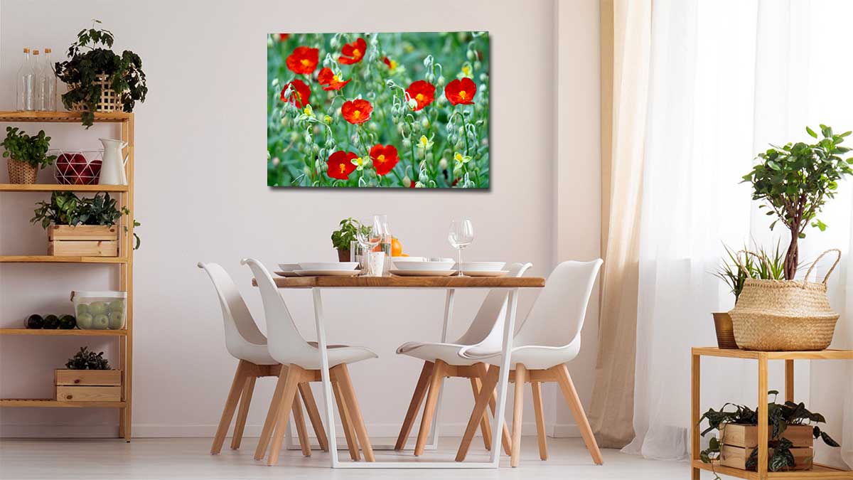 An artistic photo of flowers printed on a poster transforms a dinning room