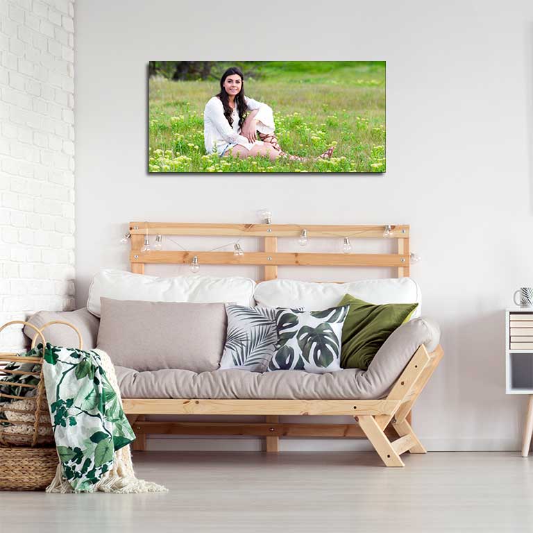 Panoramic print featuring a picture of a young lady in a wildflower meadow