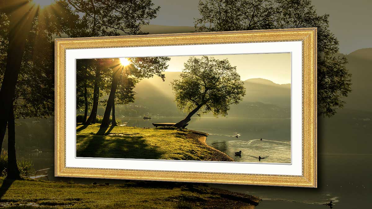 Panoramic photo of a lake in a gold frame